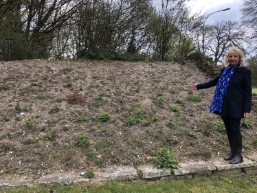 The bare flowerbed at Patcham Roundabout that used to spell out 'Welcome to Brighton' in colourful flowers